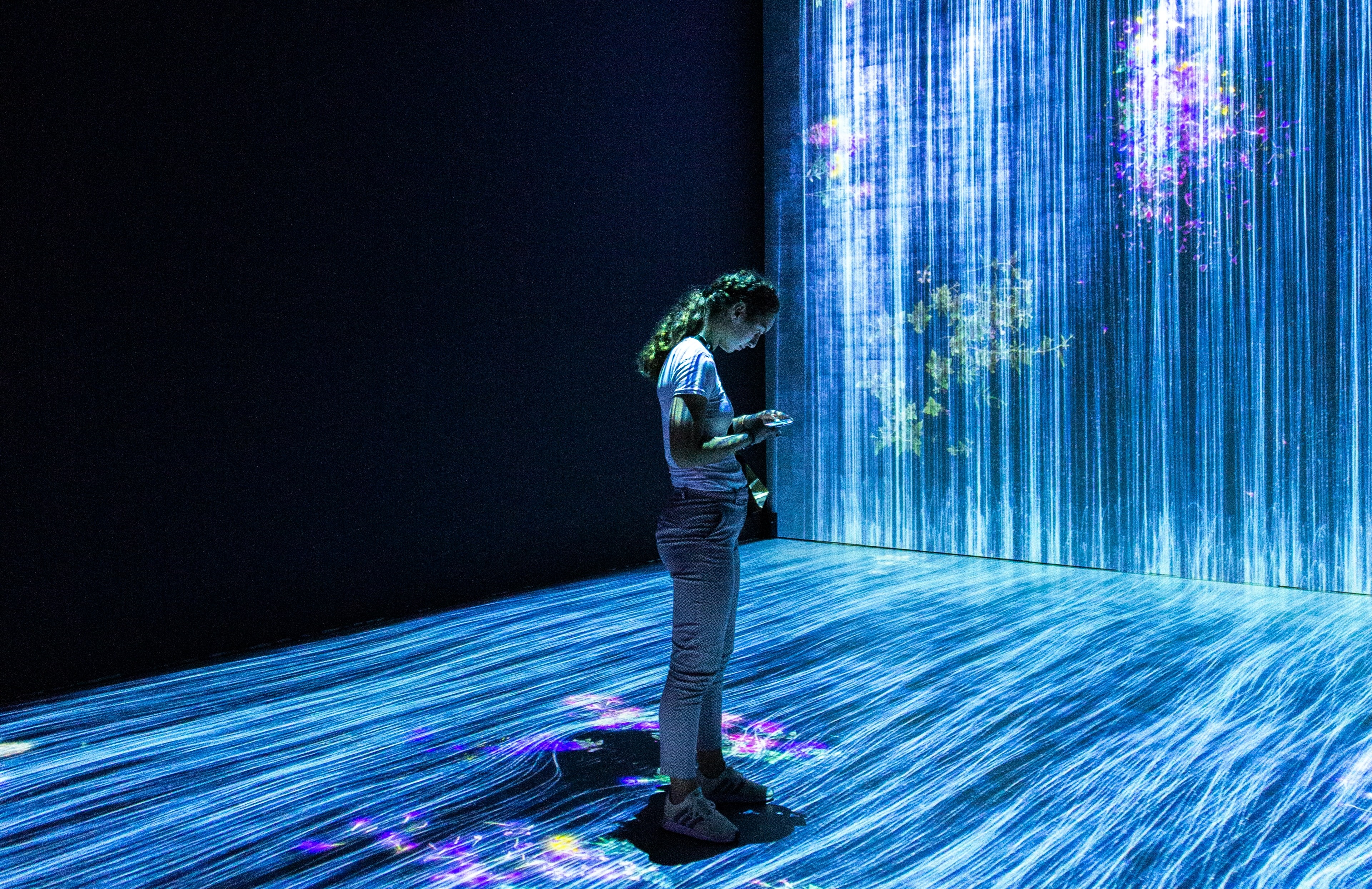 An image of a woman in a stream of data